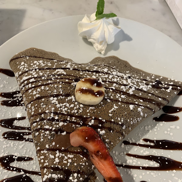 GF Nutella crepe with strawberries and bananas.