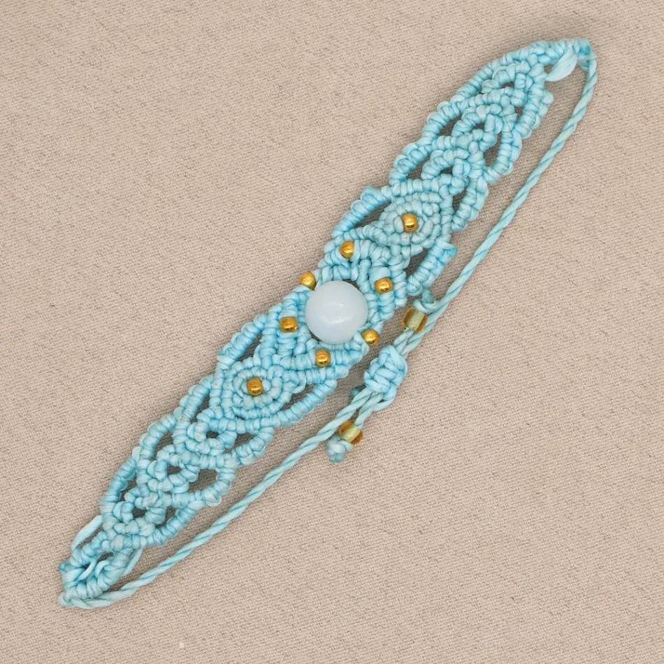 Pulseira vintage em corda de cera com estilo étnico. Um acessório charmoso e estiloso para complementar seu visual com elegância e personalidade.