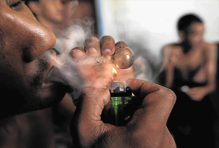 A man smokes tik in the Cape Flats. The Central Drug Agency is recommending that illicit drug use to be decriminalised. File photo.