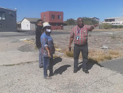 Public works minister Patricia de Lille and and Cape Town mayor Dan Plato inspect a possible site for the relocation of refugees.