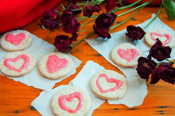 Raspberry shortbread 'love hearts' with raspberry cream cheese frosting