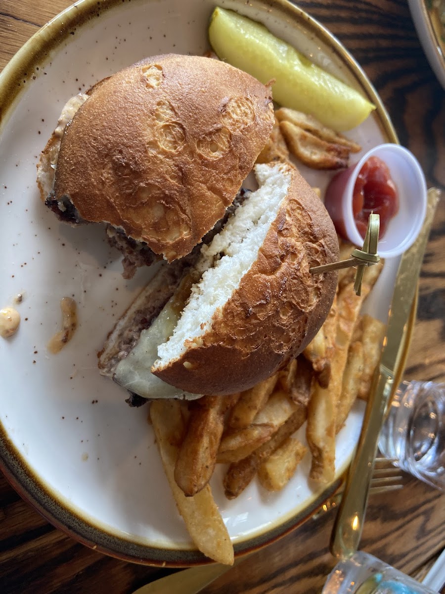 Burger with gf bun and fries.