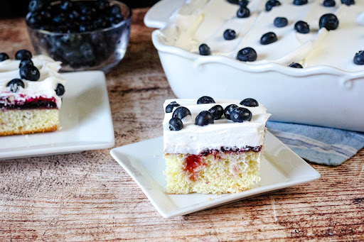 A slice of Easy Berrylicious Cake on a plate.