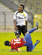 RARE START: Lokeren's Ayanda Patosi watches as Viktoria Plzen's Vladimir Darida falls during their league match in BrusselsPhoto: REUTERS