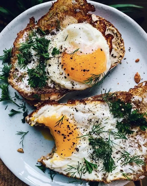 Fried Egg (With 2 Slices Of Garlic Bread And Potato Wedges)