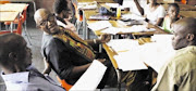 BACK TO SCHOOL: Musician Sipho 'Hotstix' Mabuse with some of his classmates.