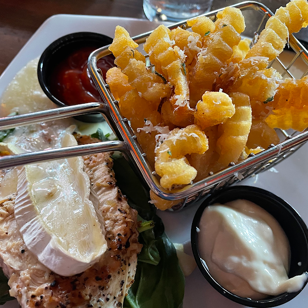 Truffle fries (deep fried, very crunchy. Dipping sauce had truffle oil and butter. Fairly salty) brie and chicken breast