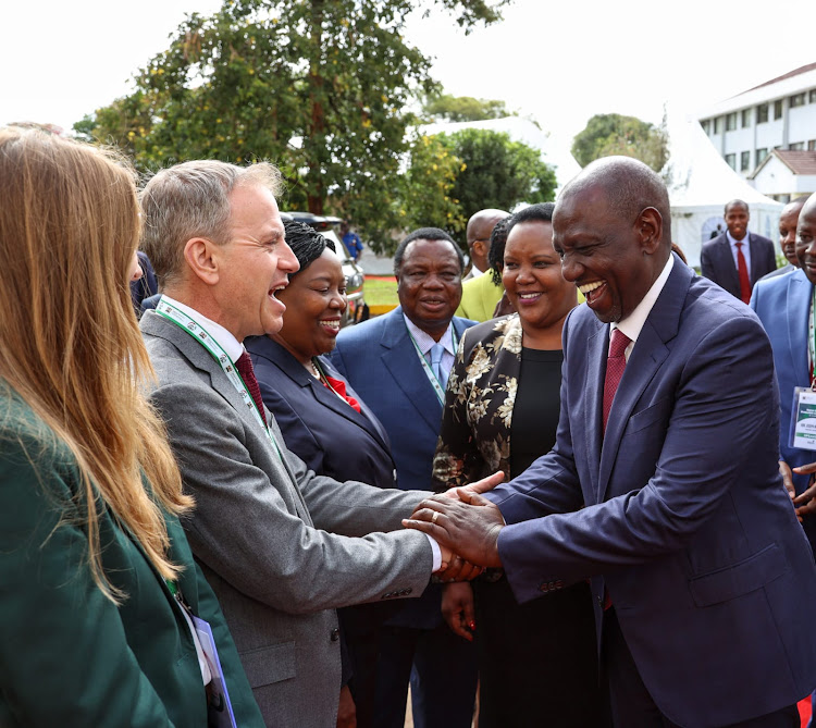 President William Ruto with leaders during the Social Protection Conference in Nairobi