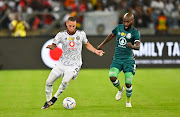Miguel Timm of Orlando Pirates is challenged by Makhehleni Makhaula, Captain of AmaZulu FC during the MTN8 Final match between Orlando Pirates and AmaZulu held at Moses Mabhida Stadium in Durban on 05 November 2022.