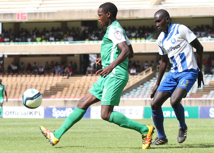 Nicholas Kipkirui of Gor Mahia vies for the ball with AFC Leopards’ Chistopher Orochum in past ,atch