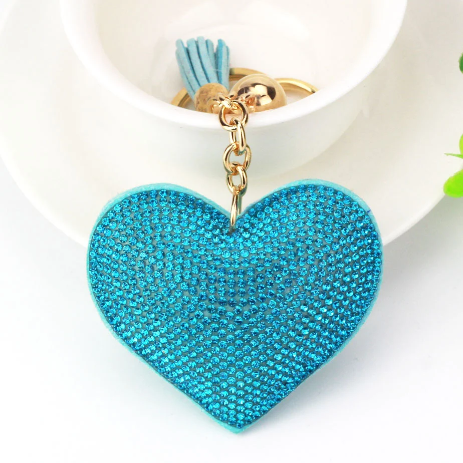 Perzik hart strass lederen sleutelhanger liefde kwastje tashanger, stijlvol accessoire voor je sleutels en tas.