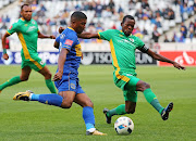 Lyle Lakay of Cape Town City FC challenged by Olaleng Shaku of Baroka FC during the Absa Premiership 2017/18 football match between Cape Town City FC and Baroka FC at Cape Town Stadium, Cape Town on 21 November 2017.