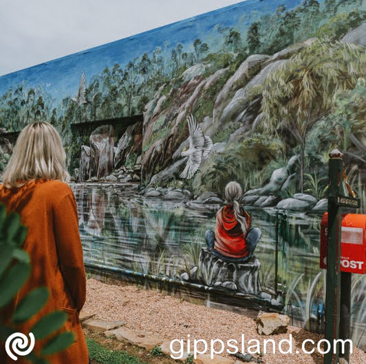 Exploring Briagolong streetscapes reveals heartwarming murals adorning various buildings, including the Post Office and General Store