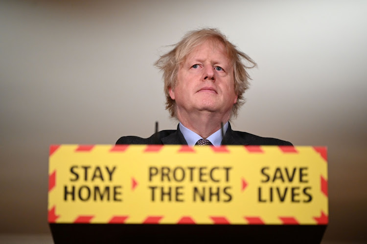 Britain's Prime Minister Boris Johnson holds a coronavirus disease (Covid-19) pandemic media briefing at 10 Downing Street in London, Britain February 22, 2021.