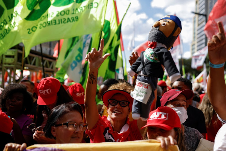 People attend an event organised by labour unions during International Workers' Day, in Sao Paulo, Brazil, May 1 2023. Picture: AMANDA PEROBELLI/REUTERS