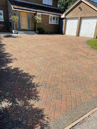 Block paving cleaning and sealing services.  album cover