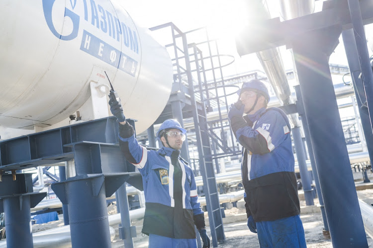 Controversial assets: Employees work at the Alexander Zhagrin oilfield operated by Gazprom Neft in Khanty-Mansi Autonomous Area–Yugra, Russia, August 30 2022. Picture: HANDOUT/GAZPROM NEFT/REUTERS