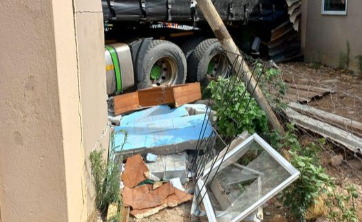 A truck left the road in the Cape Winelands District and smashed into a nearby residence, killing the driver.