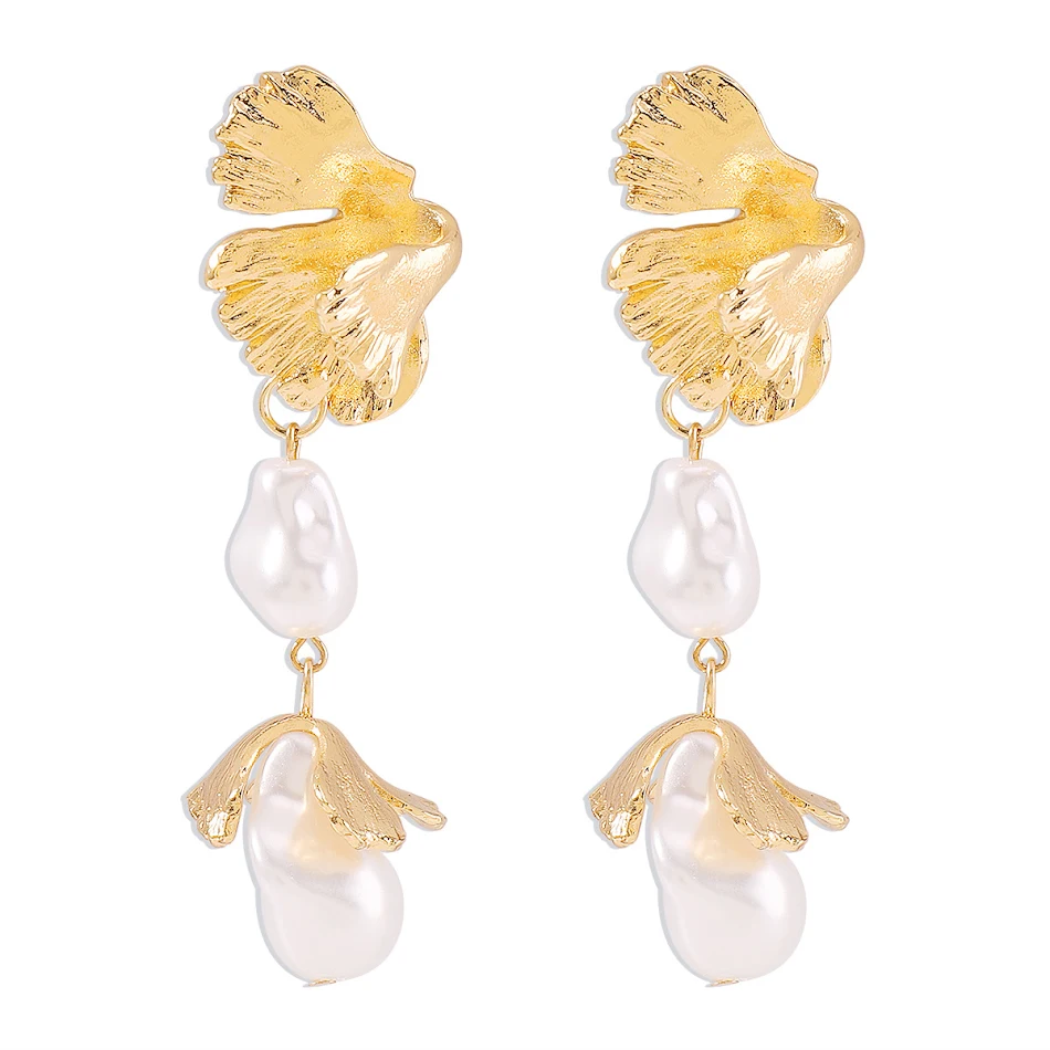 Boucles d'oreilles perles feuilles métalliques style marée Élégance intemporelle. Parfaites pour toutes occasions. Sublimez votre look avec ces bijoux.