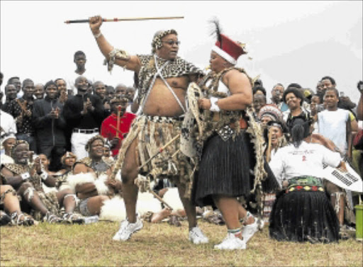 TRADITIONALIST: President Jacob Zuma celebrates during one of his weddings. Photo: SIMPHIWE NKWALI