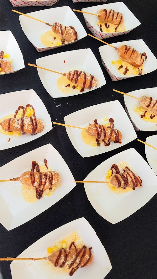 Photo Recap of Tastes of Spain, La Ruta PDX 2017, Chef Javier Canteras of Urdaneta presents Txistorra Corn Dog with Kalimotxo ketchup, corn crema, sour corn, idazabl cheese