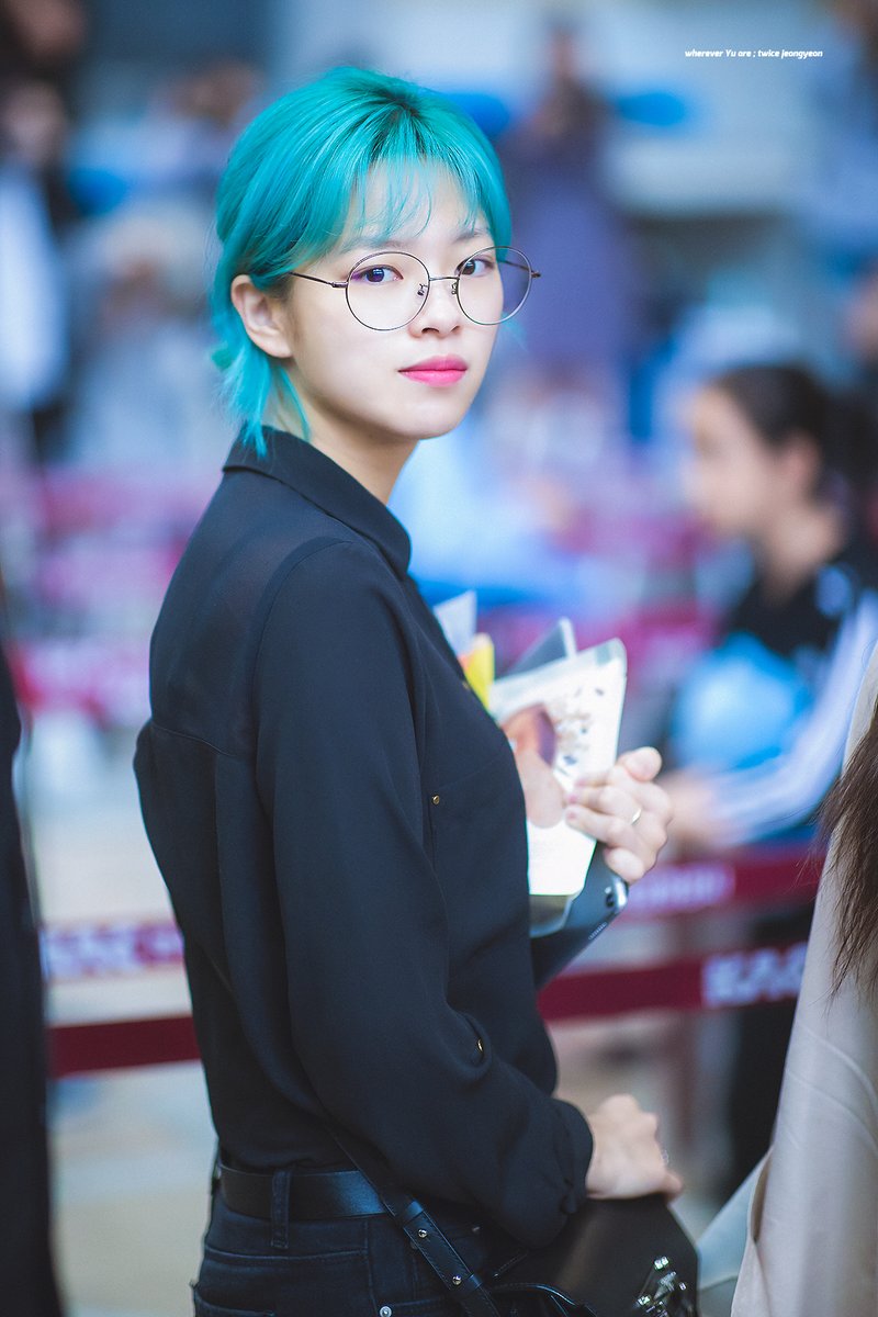 Literally Just 60 Photos Of TWICE Jeongyeon's Bright Blue Hair