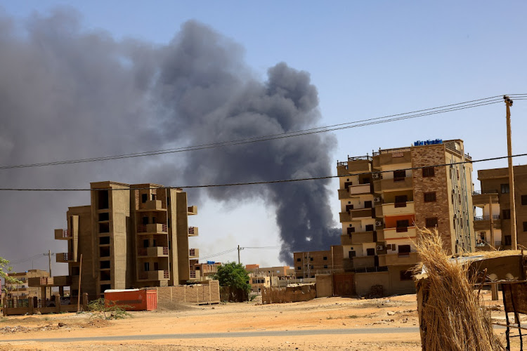 Smoke rises above buildings after an aerial bombardment, during clashes between the paramilitary Rapid Support Forces and the army in Khartoum North, Sudan, in this May 1 2023 file photo. Picture: MOHAMED NURELDIN ABDALLAH/REUTERS