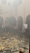 Scenes of damage at parliament where a fire broke out on Sunday morning