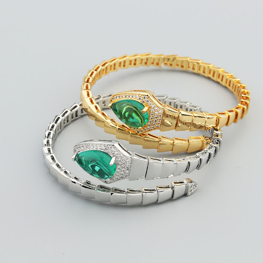 Title 10, Spring Type Snake Bone Bracelet Ring Suit, a un...