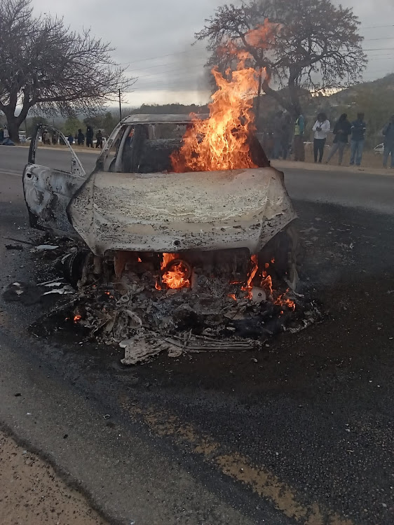 After robbing the cash van, the robbers set fire on the vehicle they used to ram into the cash van.