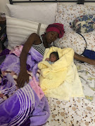 Philisiwe Mabena with her newborn baby boy who fell while she was giving birth to him at South Rand Hospital in Joburg. 