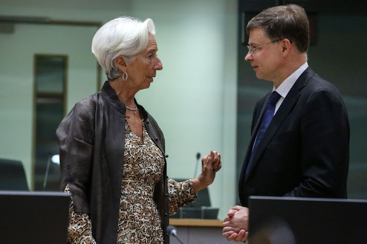 Christine Lagarde, president of the European Central Bank (ECB), left, and Valdis Dombrovskis, trade commissioner for the European Union (EU), at Eurogroup meeting at the European Council headquarters in Brussels, Belgium, on Monday, July 11, 2022.