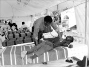 EMERGENCY: Zimbabwean Lovemore Dube receiving treatment at Messina Hospital yesterday after he was diagnosed with cholera. Four people have already succumbed to the water -borne disease. 24/11/2008. Pic. Chester Makana.  © Sowetan