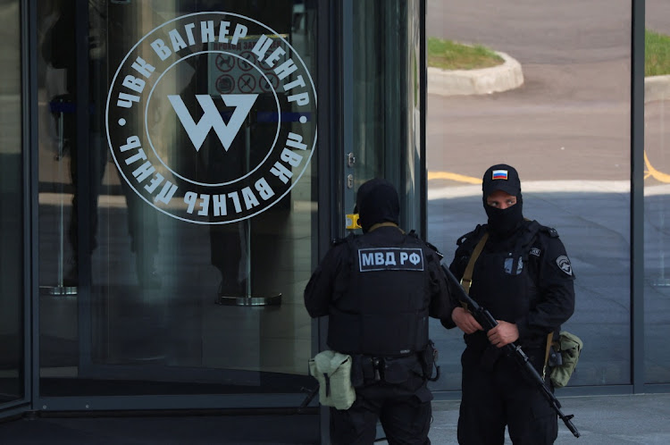 Russian law enforcement officers stand guard outside PMC Wagner Centre in Saint Petersburg, Russia, June 24 2023. Picture: ANTON VAGANOV/REUTERS