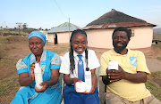 Snikiwe with her proud parents Weziwe and Jabulani Xaba at home in  Nqabeni village,  Izingolweni, on the lower south coast of KwaZulu-Natal. 