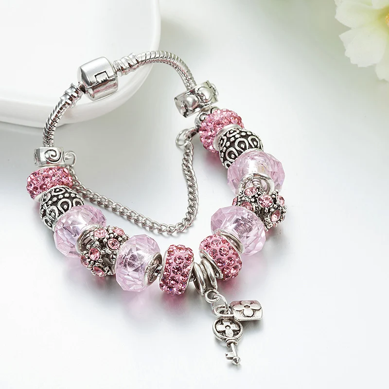 Mode sleutelhanger met grote gat glazen kralen hanger en kralen armband. Stijlvolle set, perfect cadeau voor elke gelegenheid.