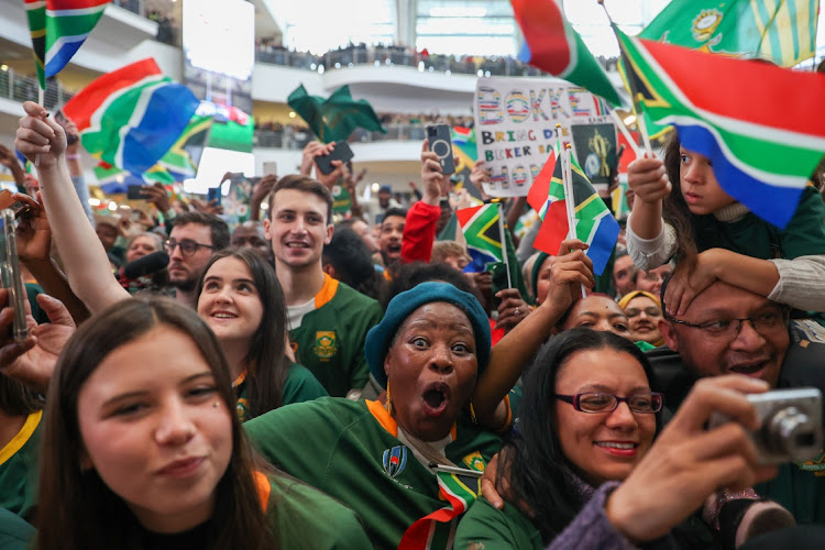 South Africans came in numbers at the OR Tambo international airport to celebrate the Springboks' rugby world cup victory. The team arrived to a packed airport full of singing and cheering fans.