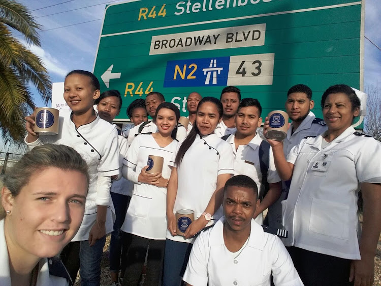 A story on a group of UWC students that raised money for Gender Based Violence by standing at intersections in Cape Town.