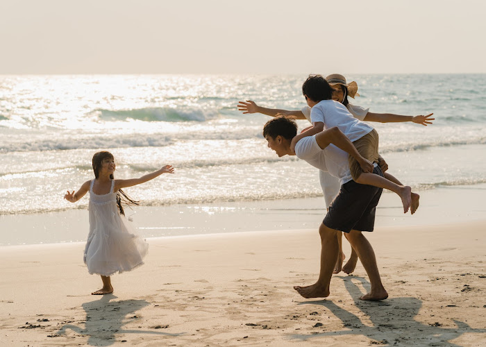 asian-young-happy-family-enjoy-vacation-beach-evening-dad-mom-kid-relax-playing-together-near-sea-when-sunset-while-travel-holiday-lifestyle-travel-holiday-vacation-summer-concept.jpg