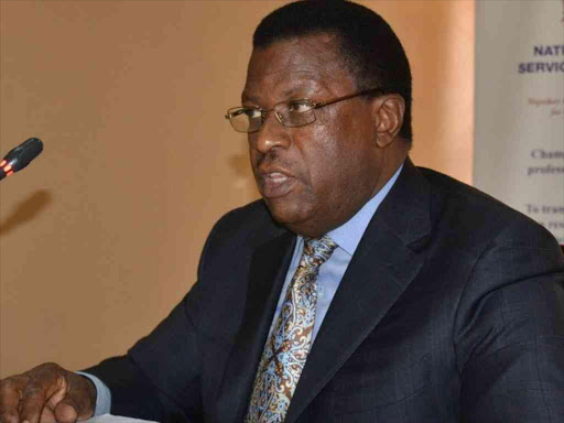 National Police Service Commission chairman Johnston Kavuludi.