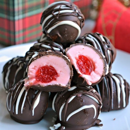 These fun and festive Chocolate Covered Cherries are a cinch to make with just a handful of ingredients.  They will make your Christmas candy and cookie trays look gorgeous.