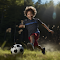 Item logo image for Boy Kick Soccer Ball in Sun Win