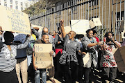 Residents of Jeppestown celebrated outside the Johannesburg Magistrate's Court in May 2014 after  Mkhululi Chonco was denied bail.