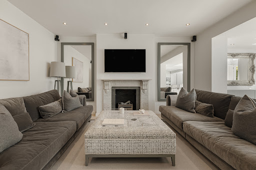 Modern living room with two grey sofas - Buy this luxury apartment / penthouse in London, 2 bedrooms