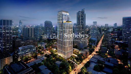 Aerial view of modern city at night in this luxury property for sale in Khlong Toei ($1,229,916 - 139 m²)