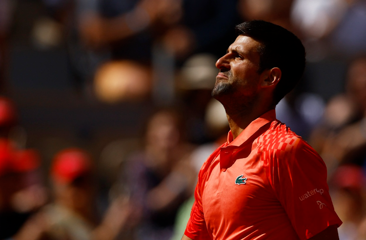 Serbia's Novak Djokovic celebrates winning his first round match against Aleksandar Kovacevic of the US at the French Open at Roland Garros in Paris on May 29 2023.