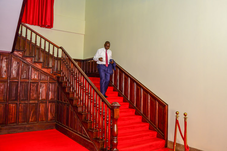 President William Ruto walking down the stairs at State House, Nairobi ahead of the last day of the Africa Climate Summit on September 6, 2023