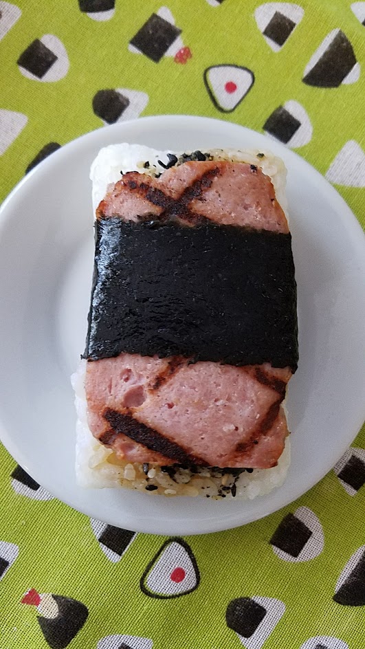 Musubi in Portland, Artisanal Spam musubi, they make their own version of SPAM so instead of the can they use their own pork shoulder, uncured ham, salt and garlic and housemade teriyaki glaze.