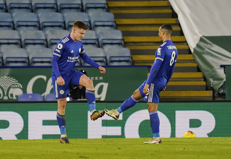 Leicester City's Harvey Barnes celebrates with Youri Tielemans