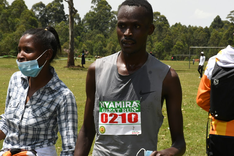 Aburi Morang'a after winning the senior men's race